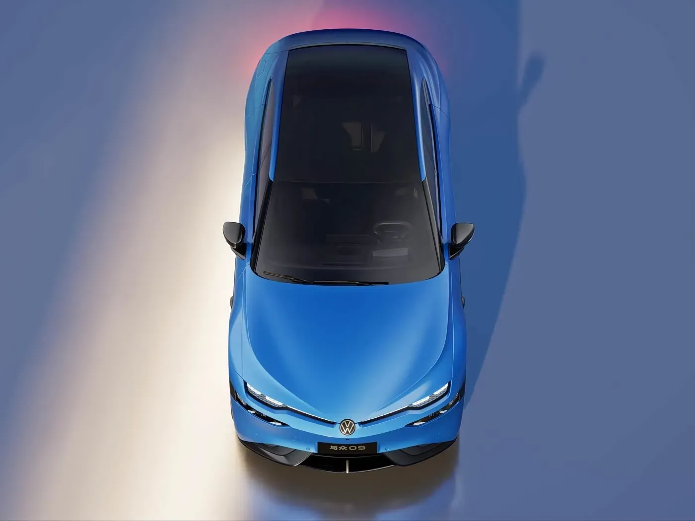 Volkswagen ID. UNYX 09 overhead studio view highlighting its coupe-like roofline and panoramic glass