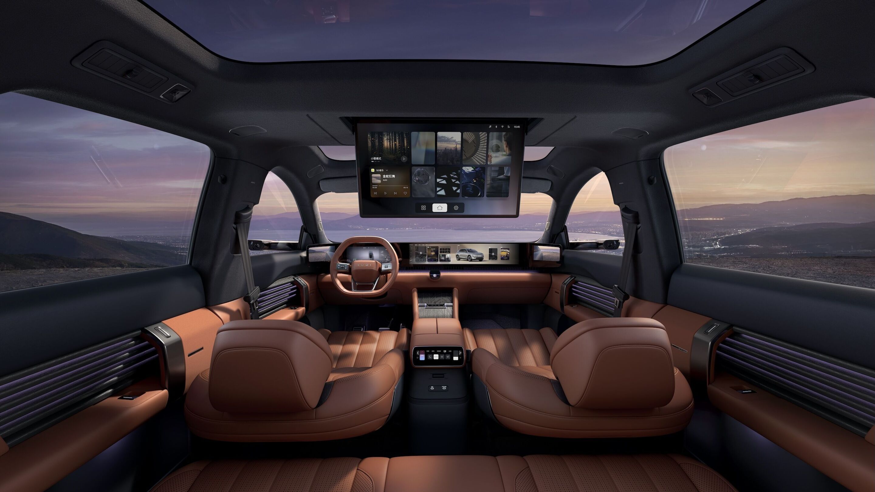 Interior cabin of the AUDI E7X showing its 27-inch curved display and dashboard layout