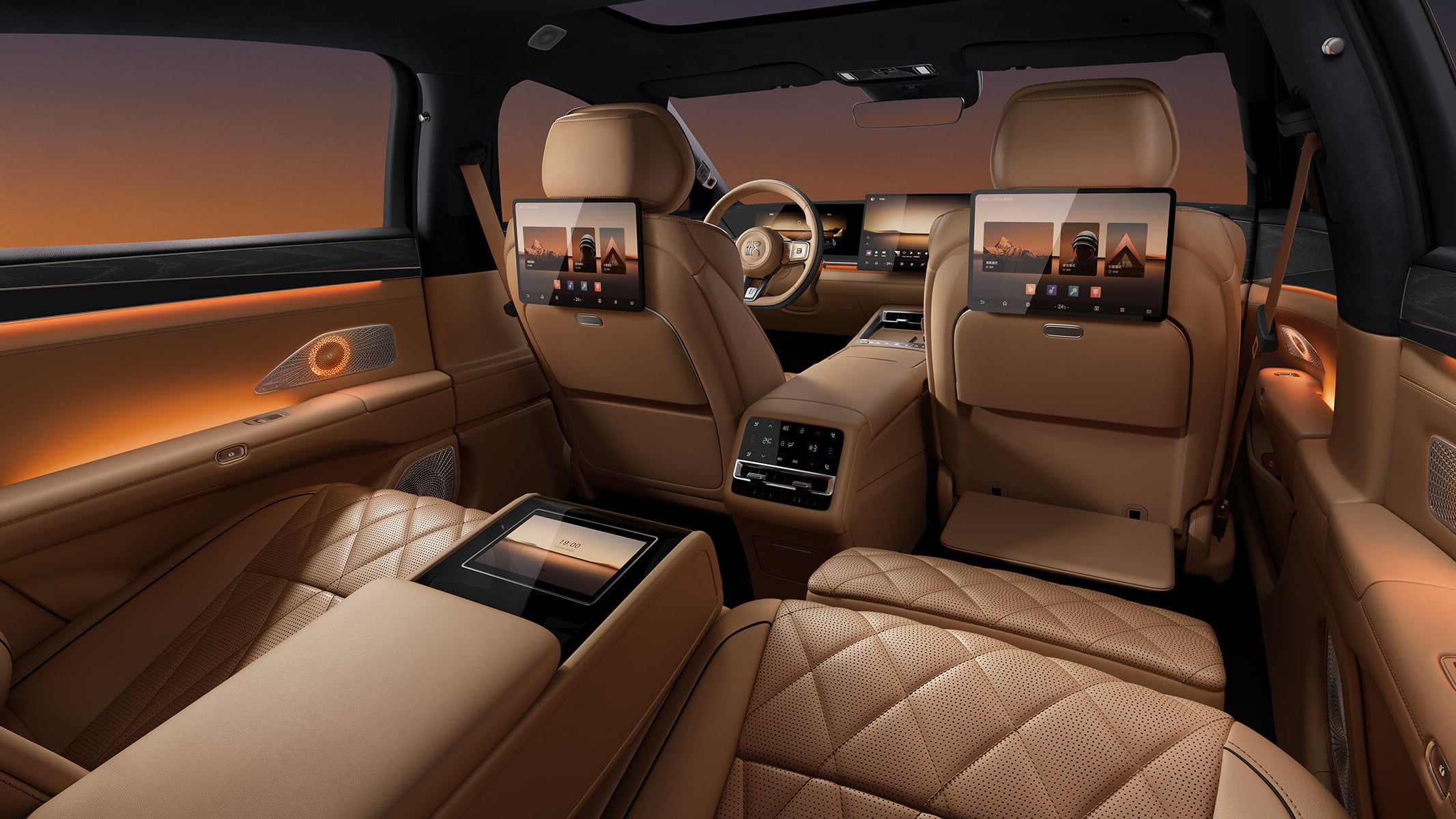 BYD Da Han EV rear cabin in tan quilted leather with seatback screens, armrest touchscreen and orange ambient lighting