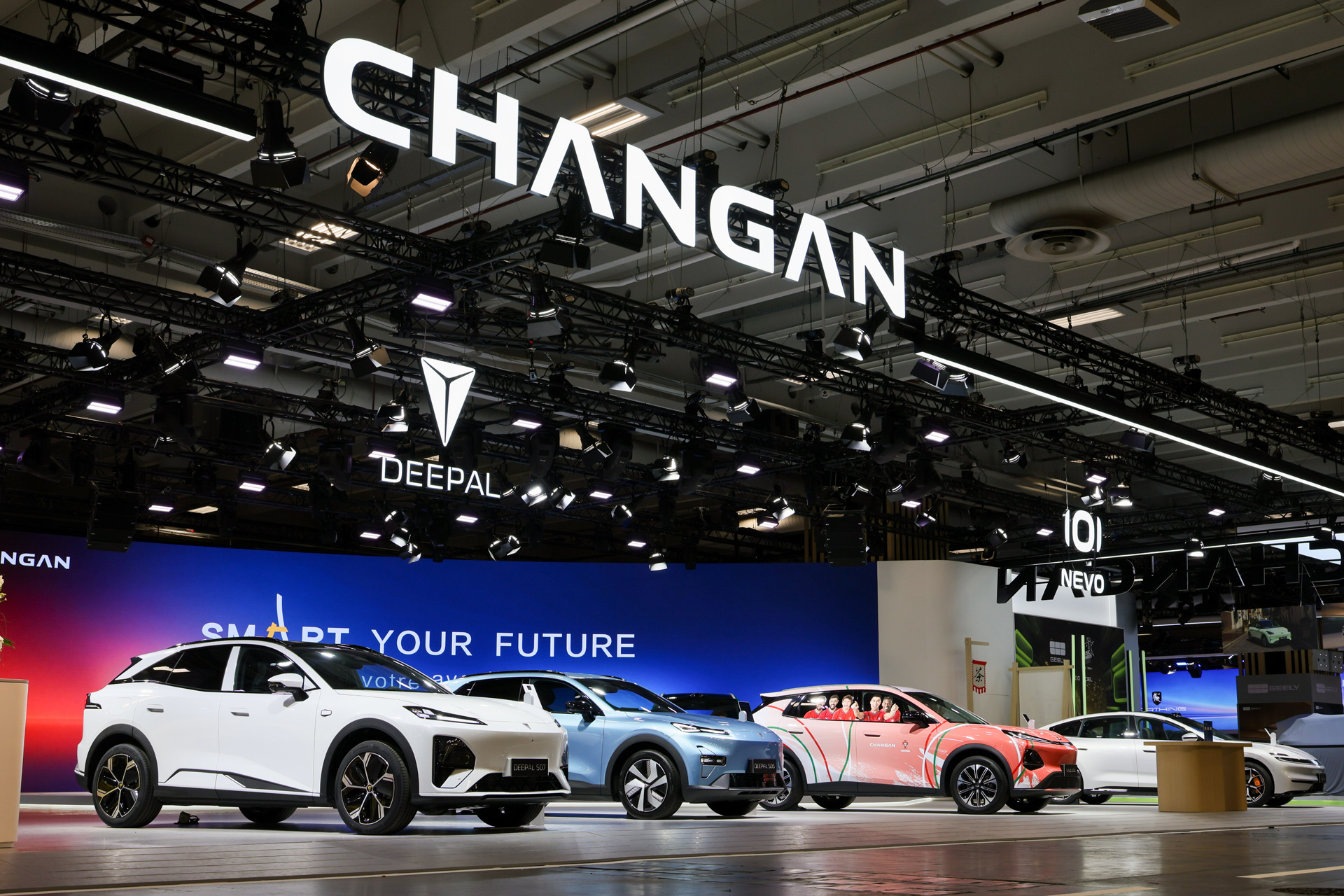 Changan stand at the 2026 Paris Motor Show with a white Deepal S07 leading a row of SUVs under Deepal and NEVO signs