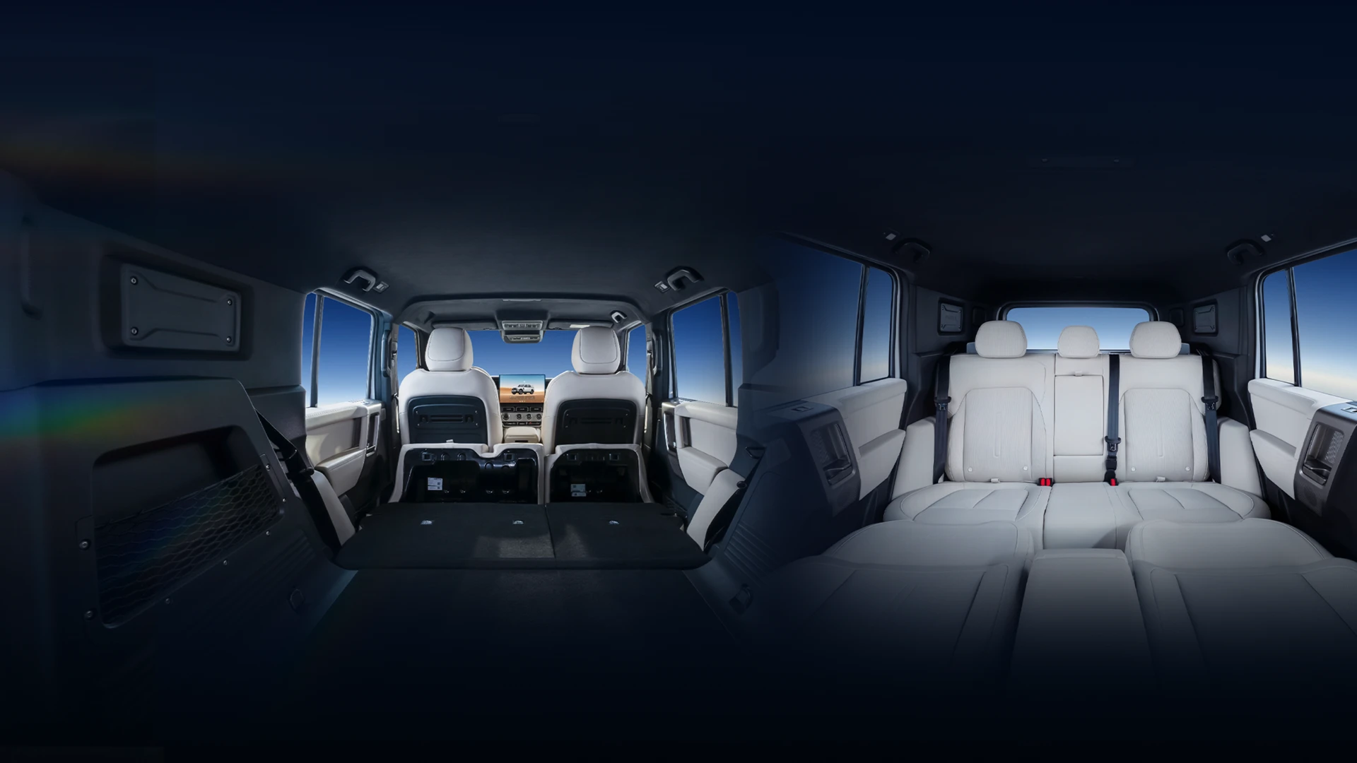 iCar V25 cabin with light grey upholstery, split view of rear seats folded flat and front seatbacks lowered to meet the rear bench