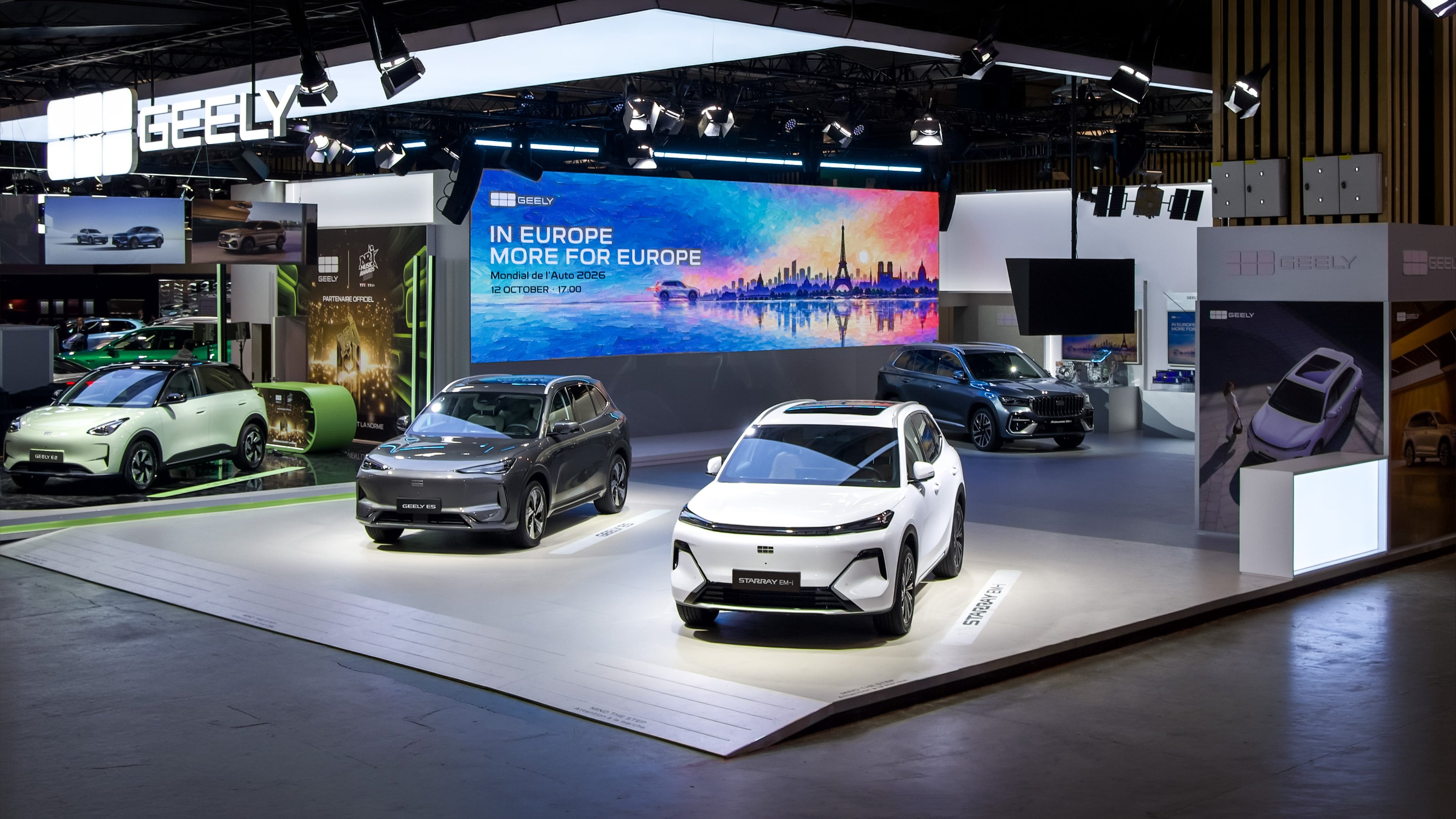 Geely Auto stand at the 2026 Paris Motor Show with a white Starray EM-i SUV in front of an In Europe, More for Europe screen