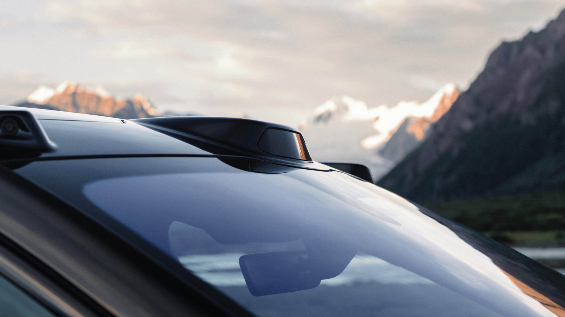 Close-up of the roof-mounted lidar housing atop the third-generation NIO ES8's windshield, part of its AQUILA sensor suite.