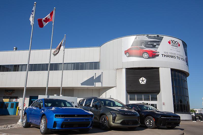 Stellantis Windsor Assembly Plant entrance with new Dodge Charger models parked outside, Windsor, Ontario