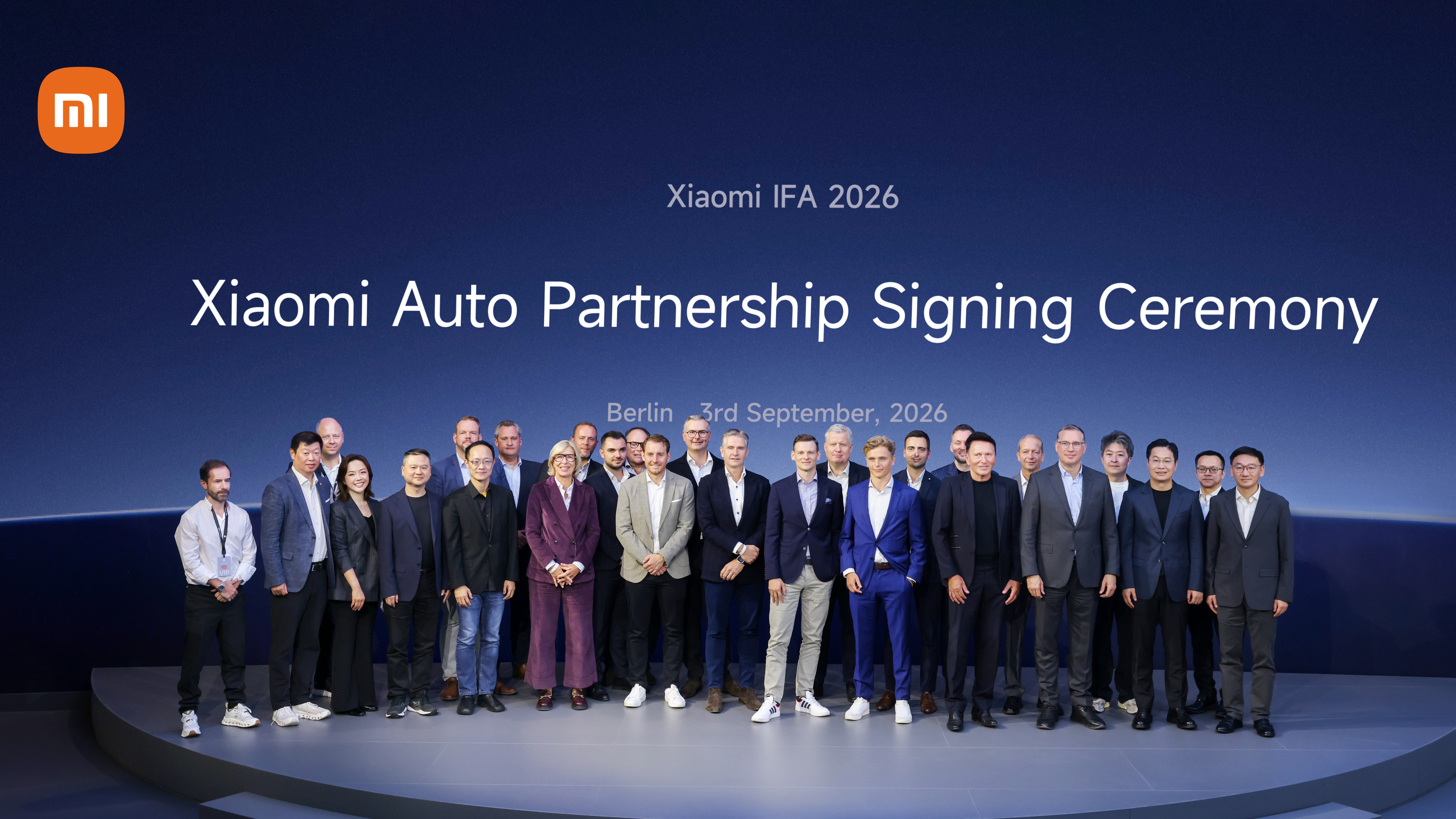 Xiaomi Auto executives and German dealer group representatives on stage at the IFA Berlin signing ceremony, September 3, 2026